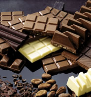 Chocolat, chocolat au praliné, chocolat au lait, tablettes de chocolat,  Guanaja, Manjari, Caraibe en chocolat noir et Jivara en chocolat au lait, truffes au chocolat,